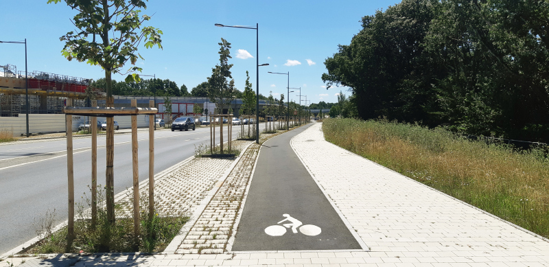 Illustration - Trottoirs et stationnement en pavés à hauteur de la station de métro
