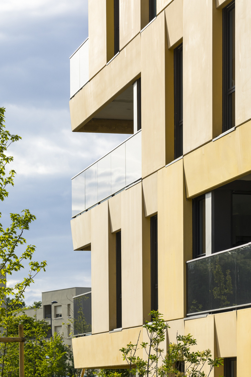 Illustration - Détail de façade: panneaux de béton préfabriqués et teintés dans la masse